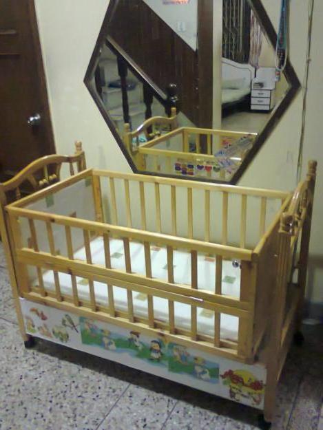 Comment choisir un lit bébé? Les dimensions d'un lit de bébé standard et non seulement